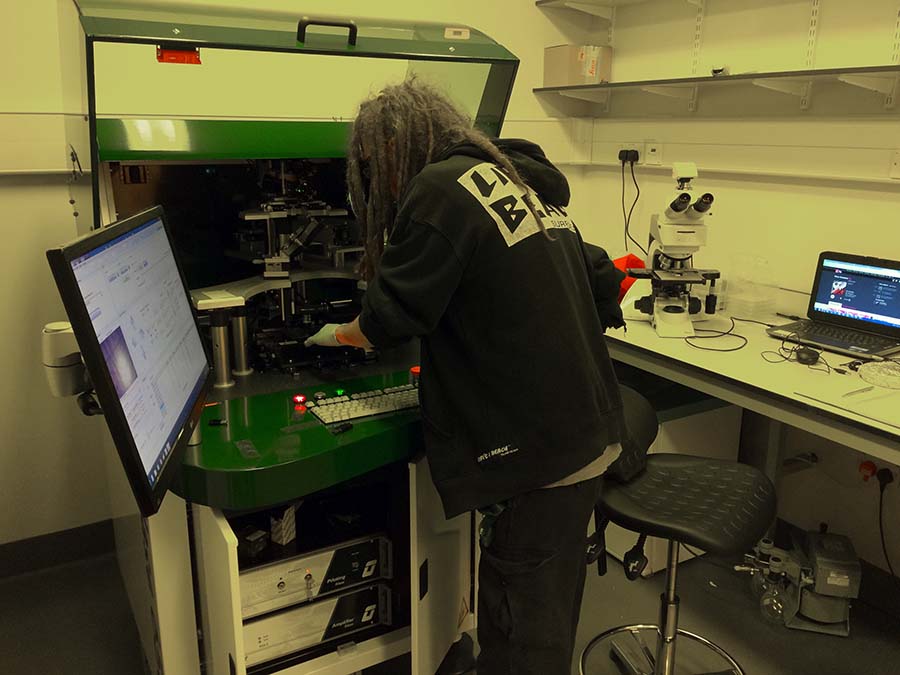 Sainsbury Laboratory microscopy specialist using the Kloe Dilase 650 Laserwriter to manufacture a microfluidic device