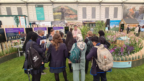 Professor Henrik Jönsson speaking to students visiting the RHS Chelsea Flower Show 2025