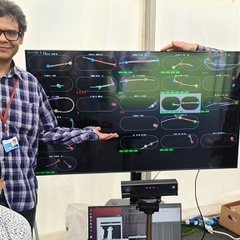 Carlos Lugo Vélez, Eashan Saikia and François Nédélec demonstrating their cytoskeleton simulation game Bugtiply