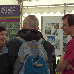 Sainsbury Laboratory postdocs talking with members of the public about plant science.