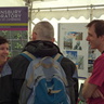 Sainsbury Laboratory postdocs talking with members of the public about plant science.
