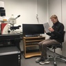 Raymond Wightman reading the user manual on the day the Leica Stellaris 5 was installed in October 2022