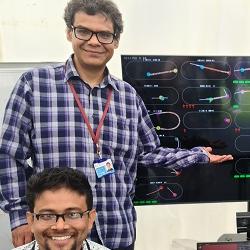 Carlos Lugo Vélez, Eashan Saikia and François Nédélec demonstrating their cytoskeleton simulation game Bugtiply