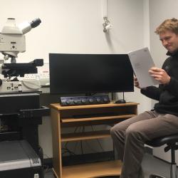 Raymond Wightman reading the user manual on the day the Leica Stellaris 5 was installed in October 2022